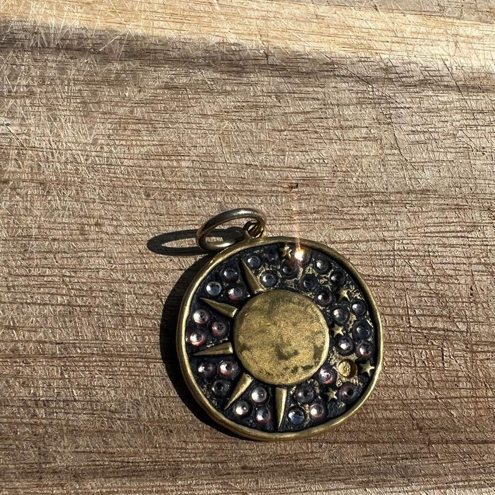 Waxing Poetic Pendant 1” missing one crystal.